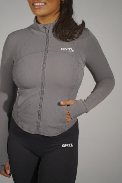 Front view of a grey contour jacket displayed on a mannequin